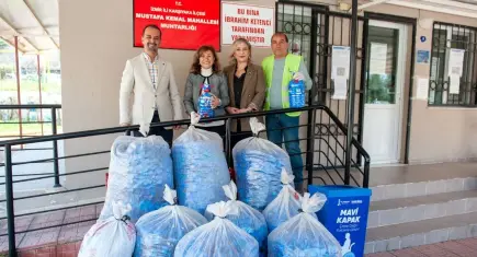 Karşıyaka’da Mavi Kapak kampanyasına Aliağa’dan anlamlı destek